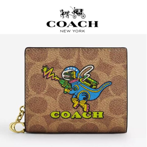 Coach Handbags - Cosmic Coach Snap Wallet In Signature Canvas With Rexy Dinosaur NWT